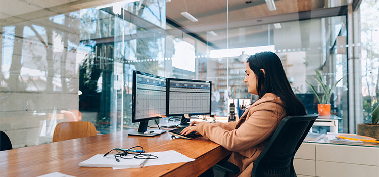 a woman works in her office