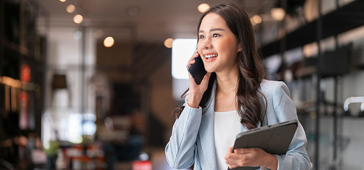 public relations marketing manager on mobile with client