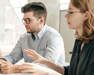 coworkers in brainstorm session